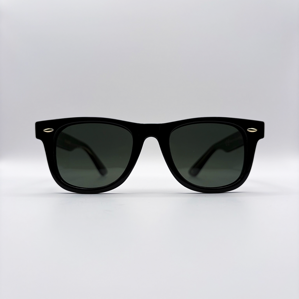 Close-up of vintage-inspired solid black Wayfarer frame with a high-gloss finish and black polarised lenses unisex vintage inspired tinted sunglasses from independent rock ’n’ roll–inspired eyewear brand Dirty Rocker 
