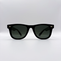 Close-up of vintage-inspired solid black Wayfarer frame with a high-gloss finish and black polarised lenses unisex vintage inspired tinted sunglasses from independent rock ’n’ roll–inspired eyewear brand Dirty Rocker 
