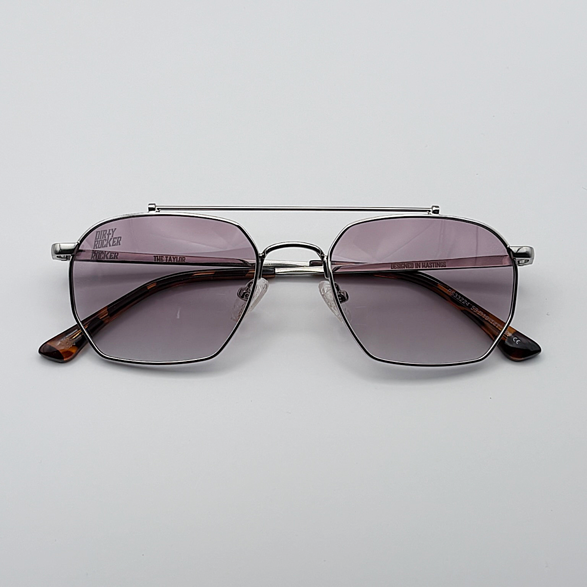 Close-up of purple gradient unisex vintage inspired tinted sunglasses from independent rock ’n’ roll–inspired eyewear brand Dirty Rocker 
