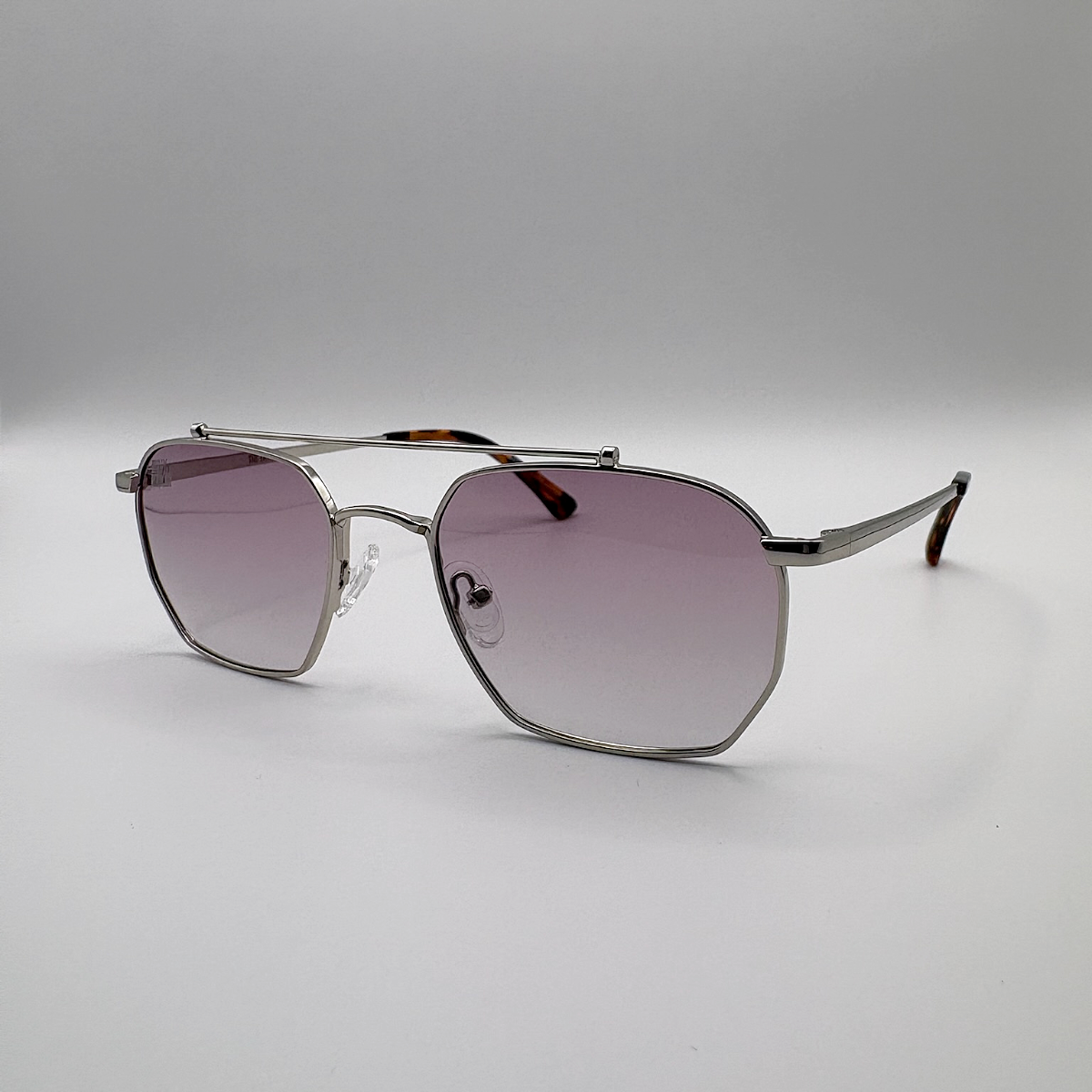 Close-up of purple gradient unisex vintage inspired tinted sunglasses from independent rock ’n’ roll–inspired eyewear brand Dirty Rocker 