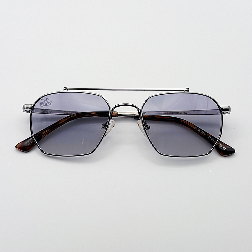Close-up of blue unisex vintage inspired tinted sunglasses from independent rock ’n’ roll–inspired eyewear brand Dirty Rocker 