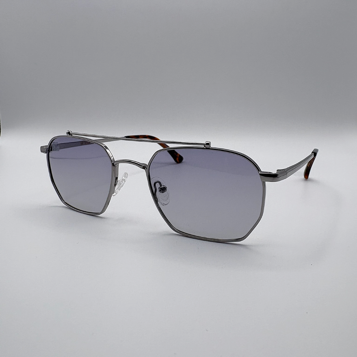 Close-up of blue purple gradient unisex vintage inspired tinted sunglasses from independent rock ’n’ roll–inspired eyewear brand Dirty Rocker 