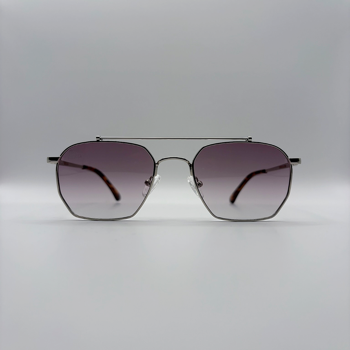 Close-up of purple gradient unisex vintage inspired tinted sunglasses from independent rock ’n’ roll–inspired eyewear brand Dirty Rocker 